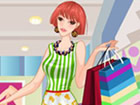 Une jeune fille élégante fait du shopping